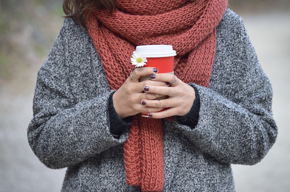 woman holding cup